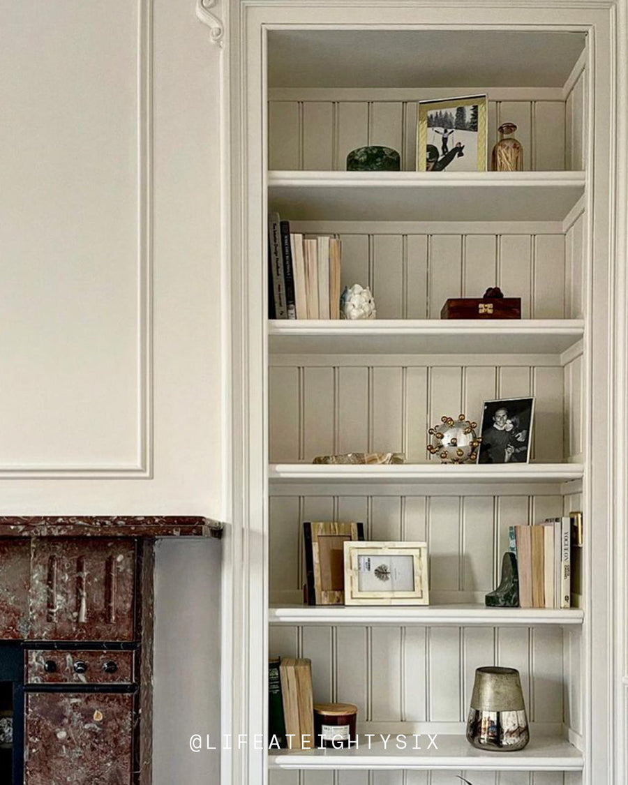 A living room decorated in Lick White 06