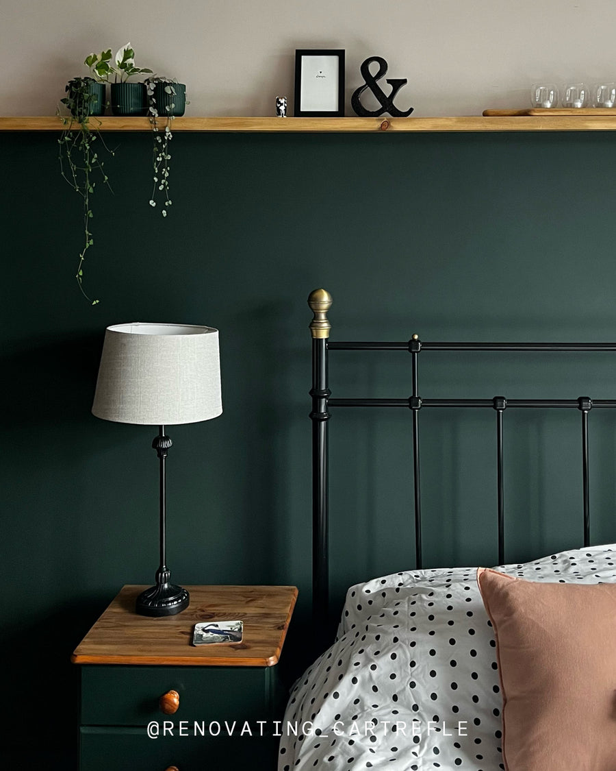 A bedroom painted in Green 06