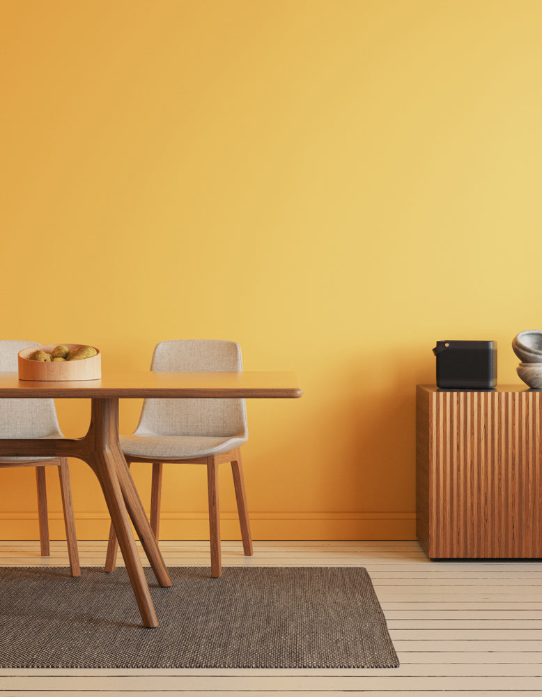 Dining room decorated in Lick Yellow 03 paint shade