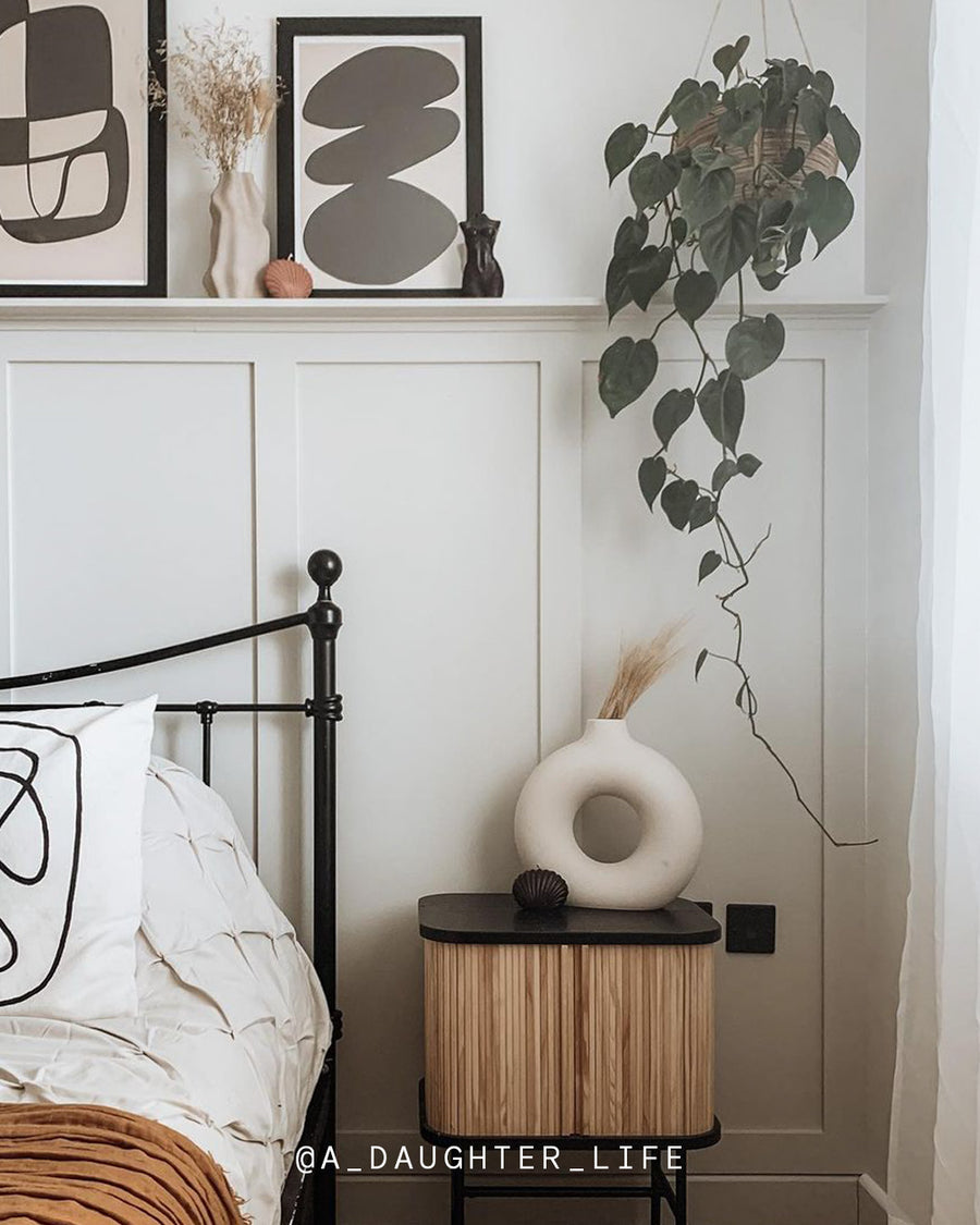 A bedroom decorated in Lick White 02