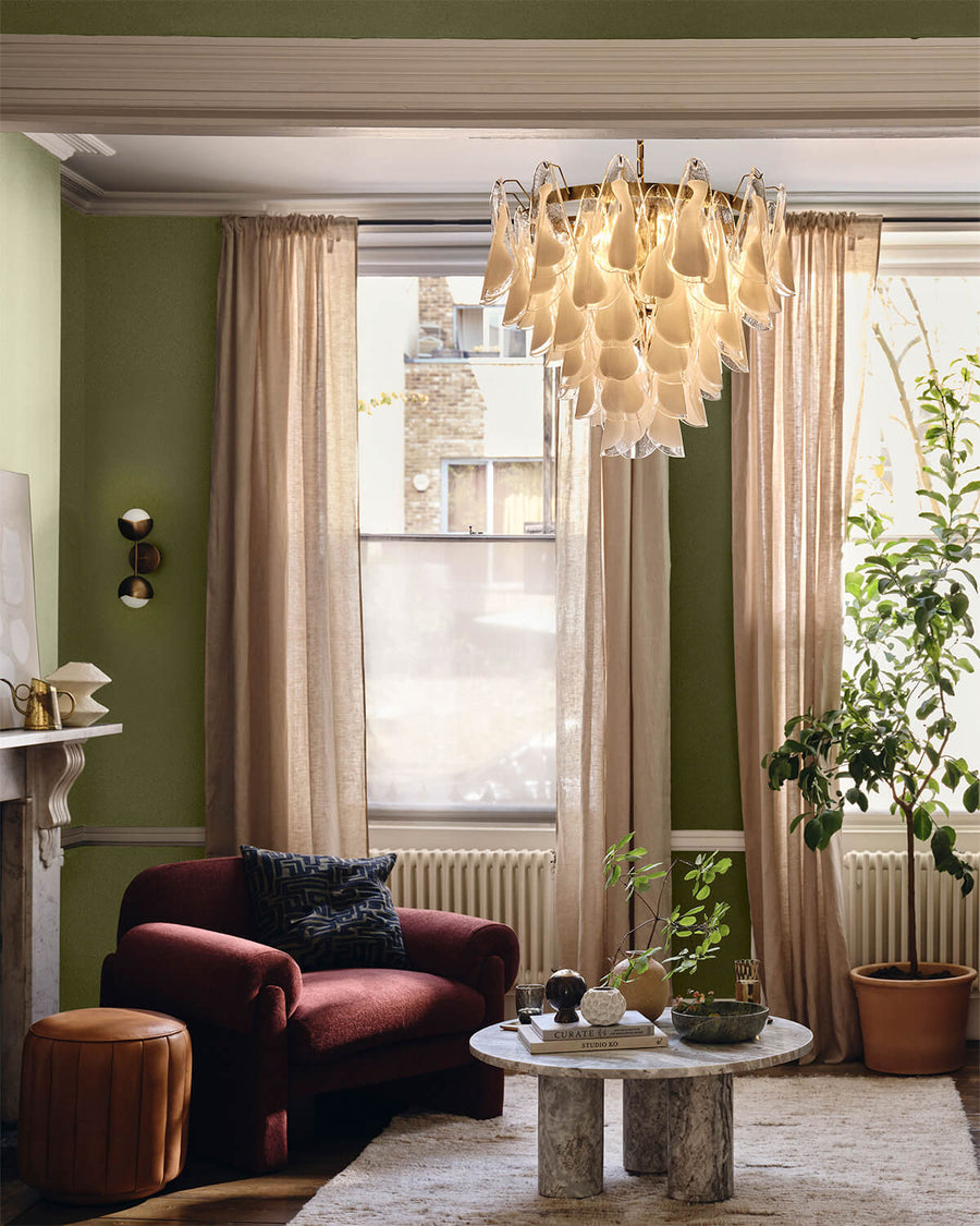 Living room decorated in lick Green 05 Rome House paint shade