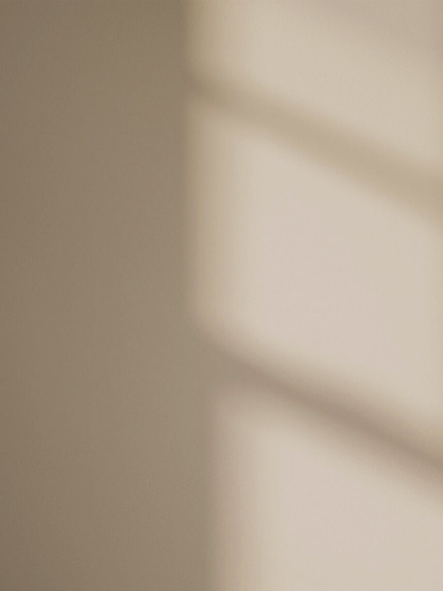 Beige 09 paint shade on the wall with shadow