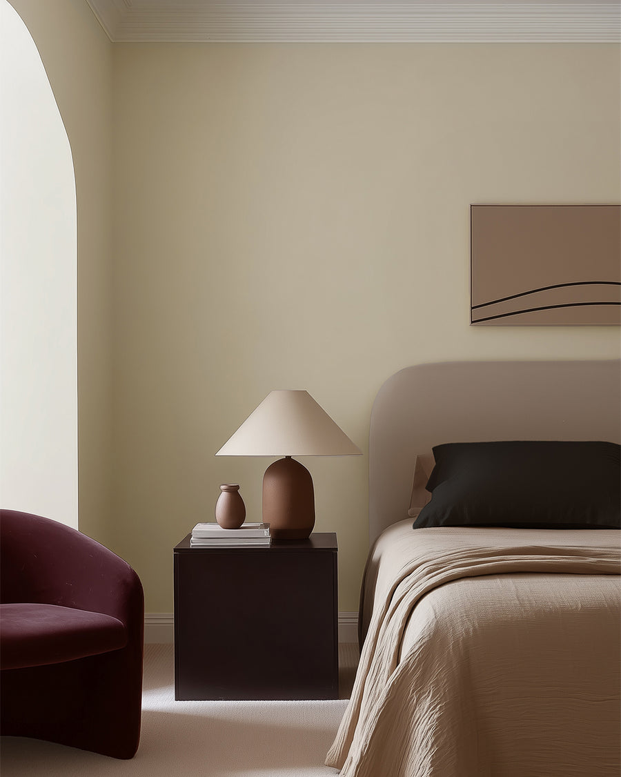 Bedroom painted in Lick Beige 01