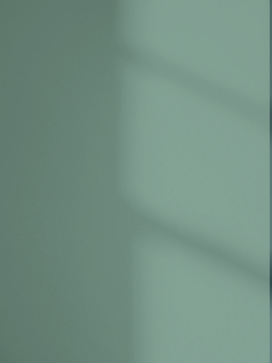 Lick Teal 05 paint shade on the wall with shadow