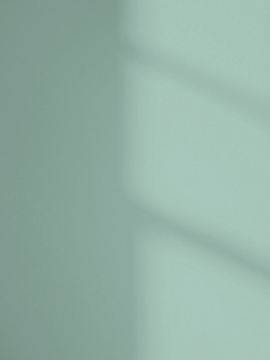 Lick Teal 04 paint shade on the wall with shadow