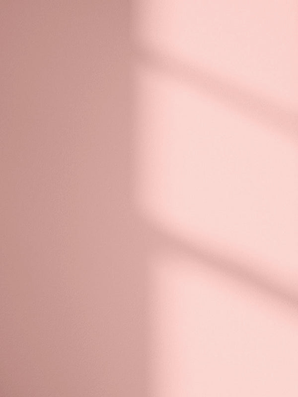 Lick Pink 09 paint shade on the wall with shadow