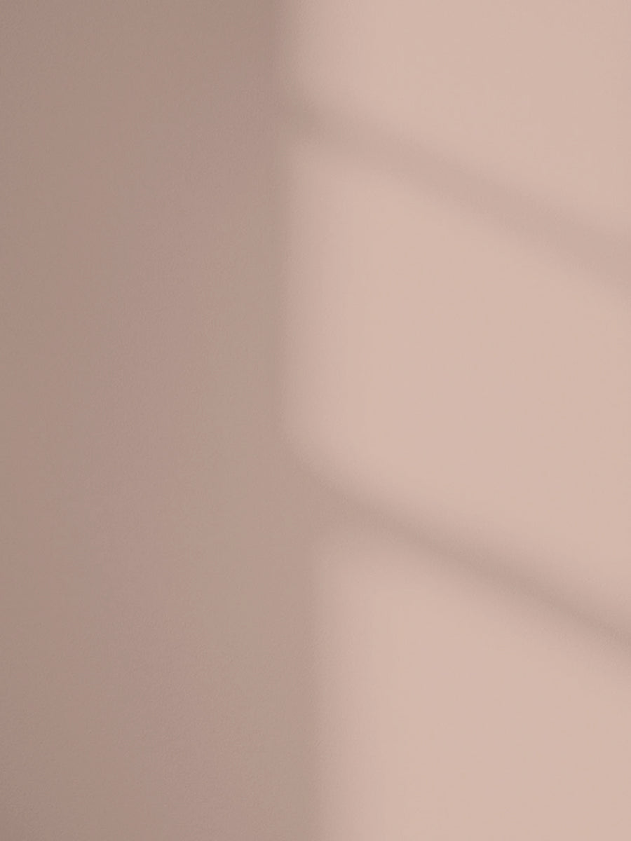 Lick Pink 08 paint shade on the wall with shadow