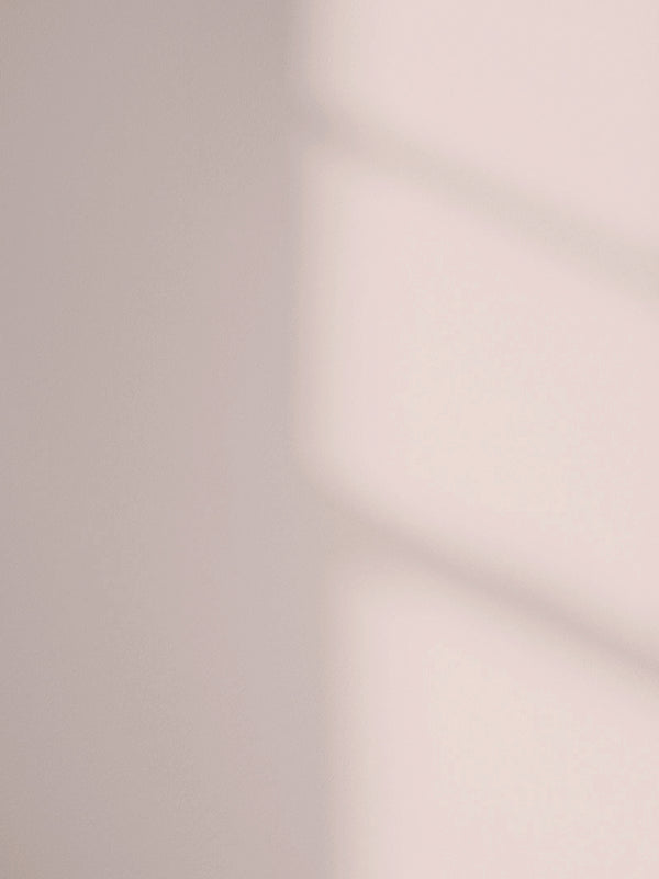 Lick Pink 07 paint shade on the wall with shadow