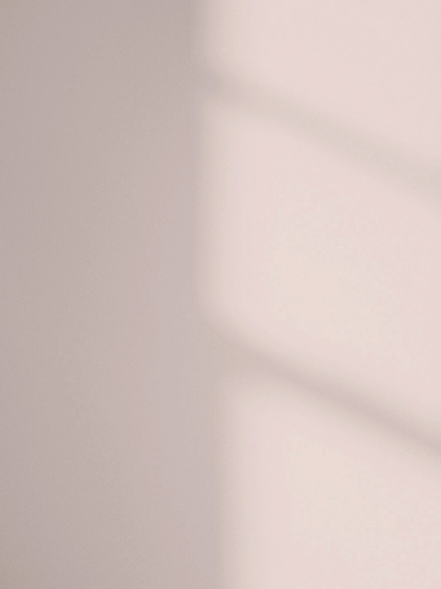 Lick Pink 07 paint shade on the wall with shadow