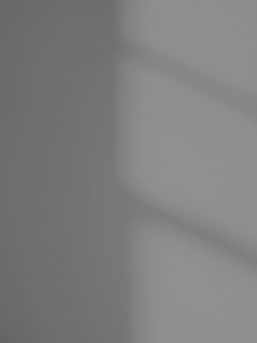 Lick Grey 15 paint shade on the wall with shadow