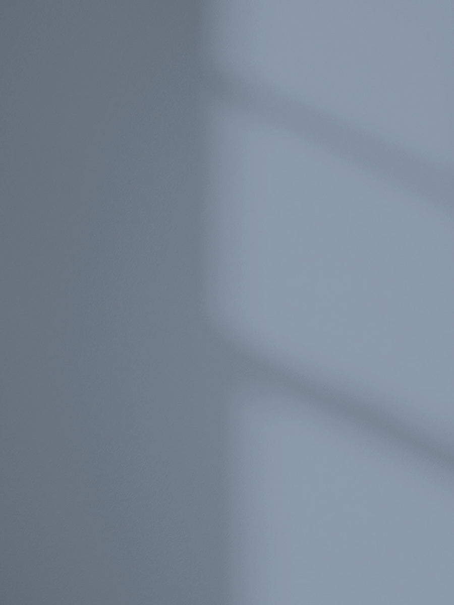 Lick Blue 17 paint shade on the wall with shadow
