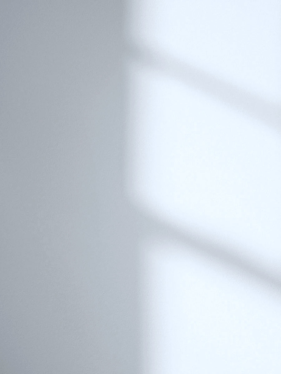 Lick Blue 14 paint shade on the wall with shadow