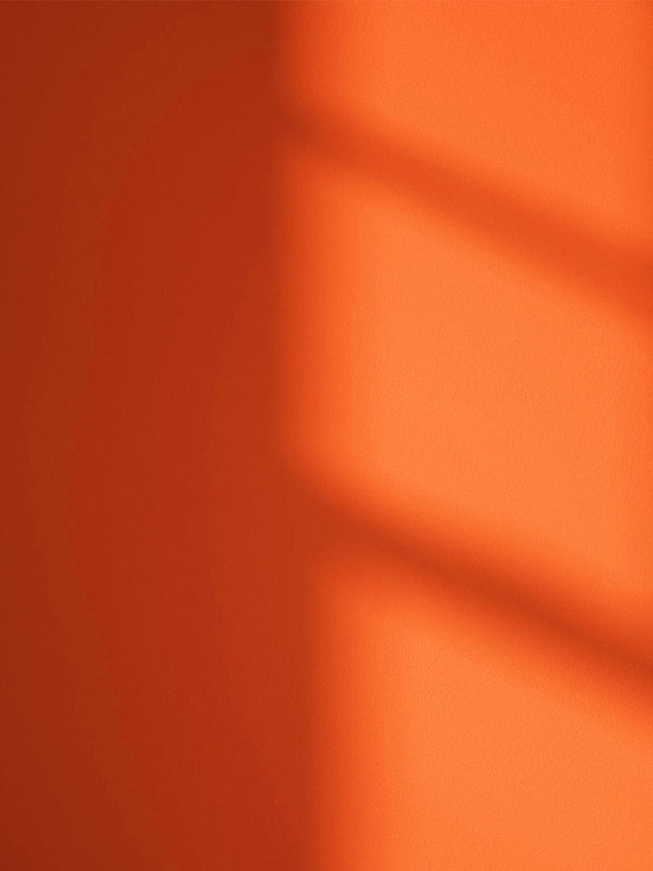 Orange 01 paint shade on the wall with shadow