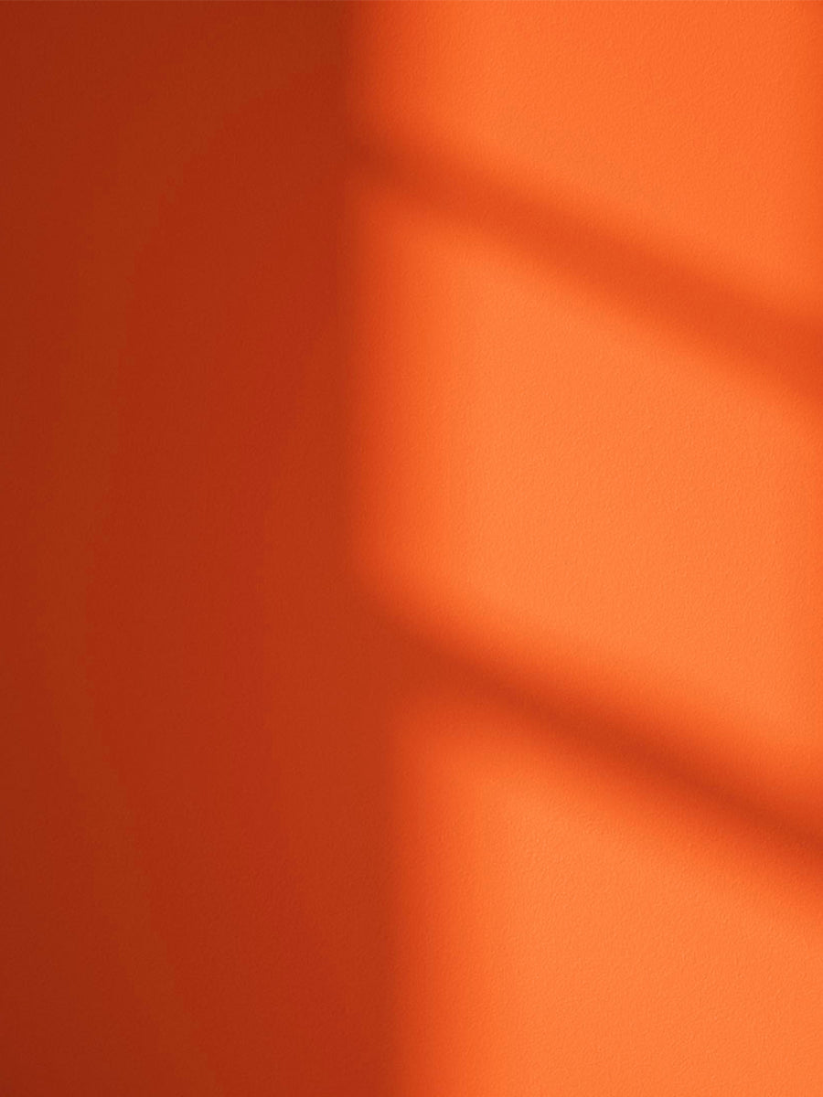 Orange 01 paint shade on the wall with shadow