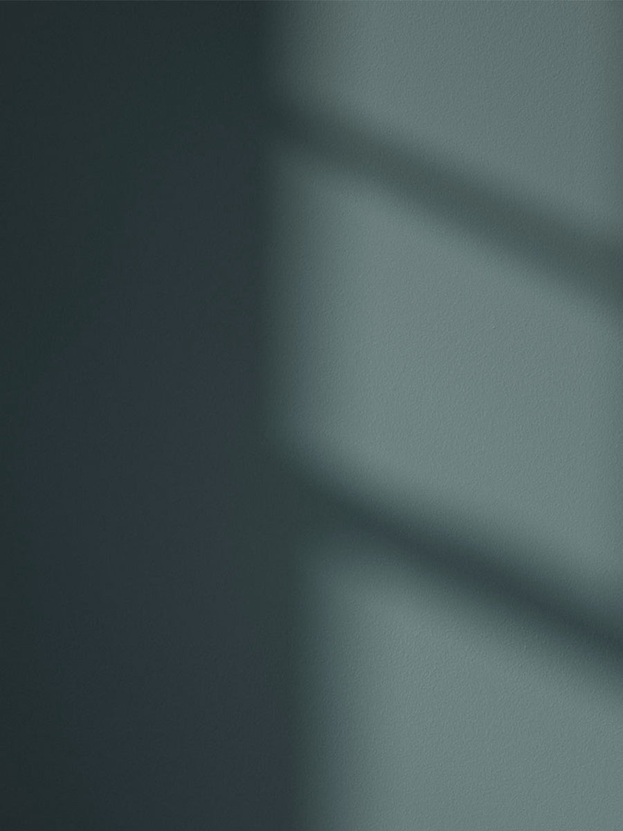Teal 03 paint shade on the wall with shadow