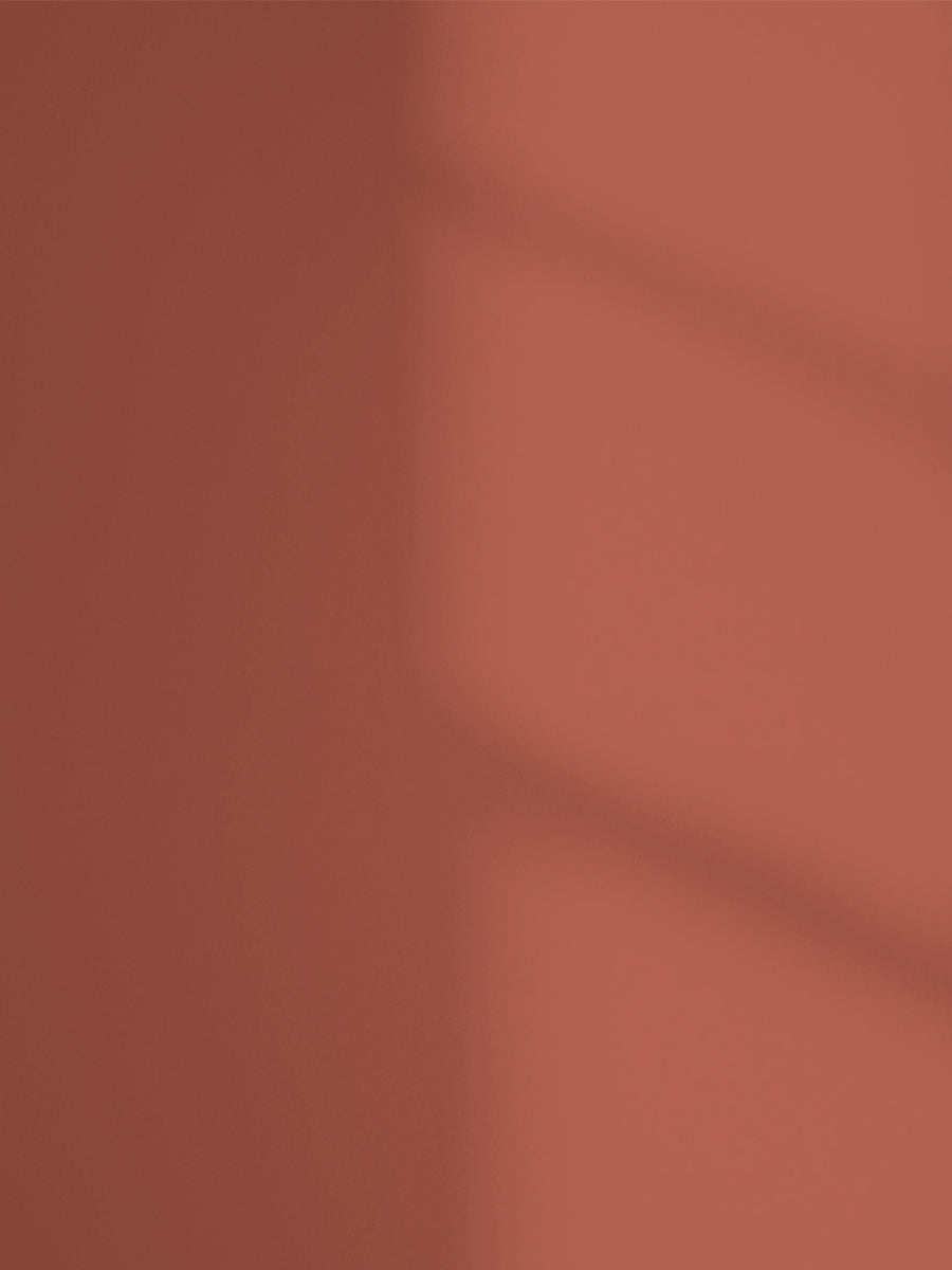 Red 01 paint shade on the wall with shadow