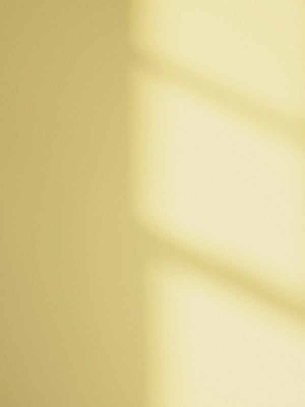 Yellow 01 paint shade on the wall with shadow