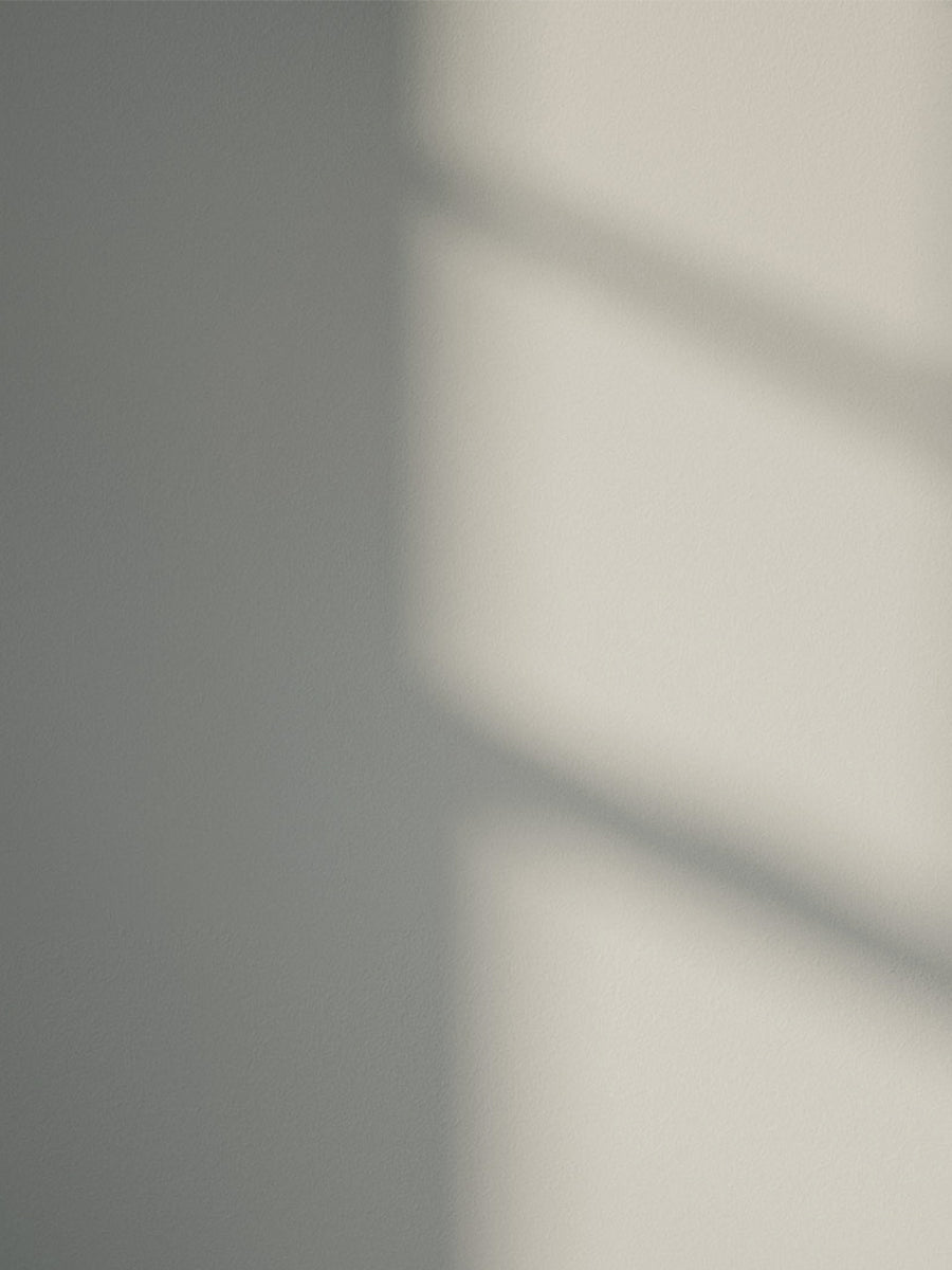 Grey 04 paint shade on the wall with shadow