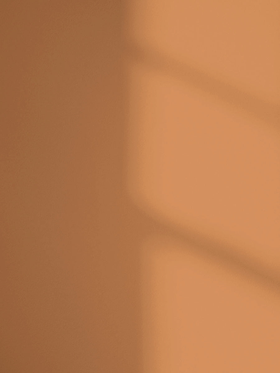 Orange 02 paint shade on the wall with shadow