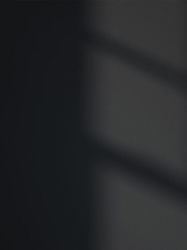 Black 02 paint shade on the wall with shadow