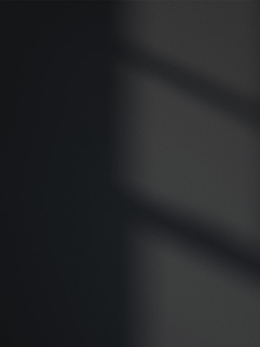Black 02 paint shade on the wall with shadow