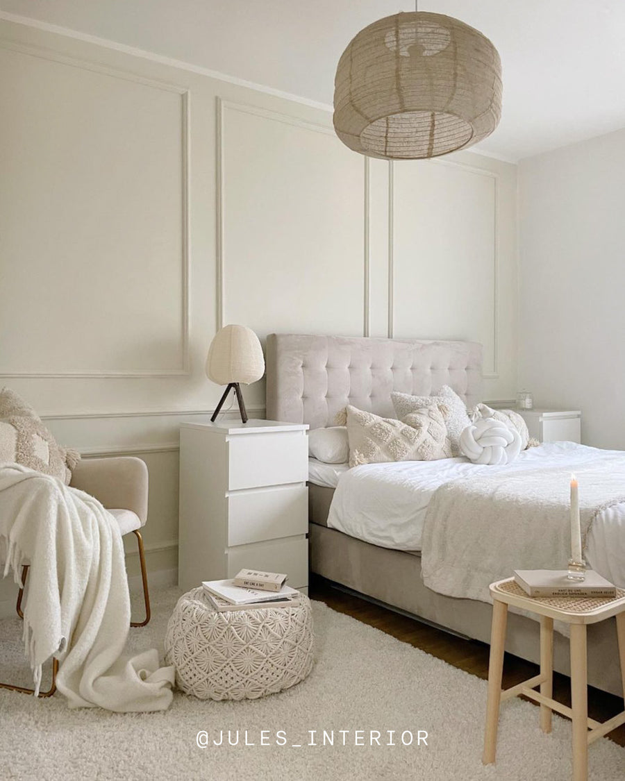 A bedroom decorated in Lick White 05 paint