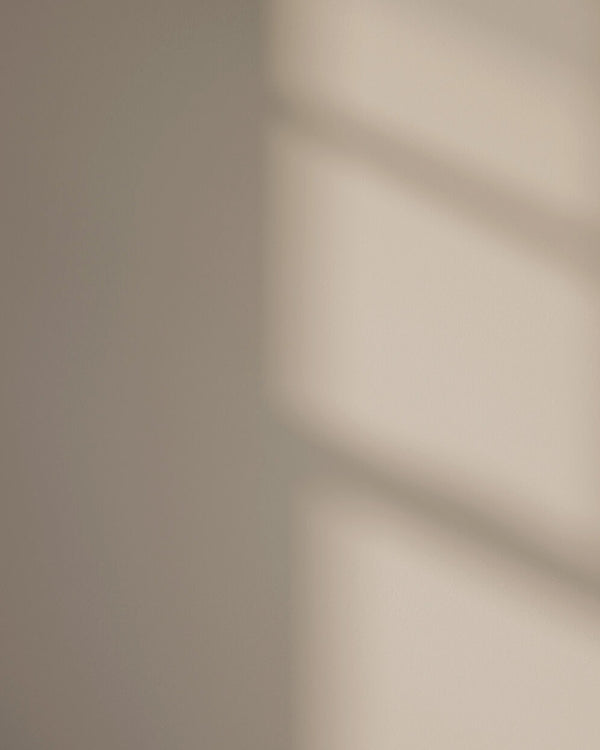 Beige 10 paint shade on the wall with shadow